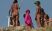 Various sexy nudists dress up as amazons or something